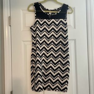Black and white geometric dress with sheer top